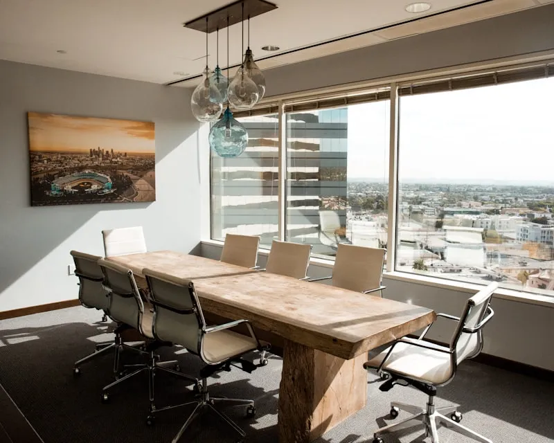 Modern executive boardroom overlooking a city skyline